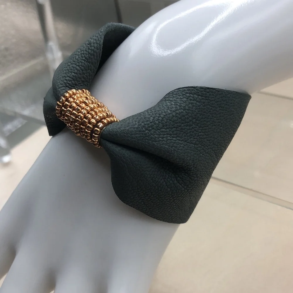 Soft leather bow shaped bracelet.